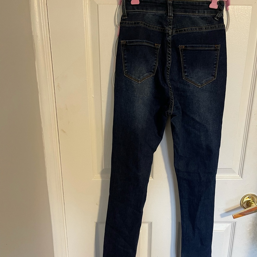 Fashion Nova dark blue ripped jeans